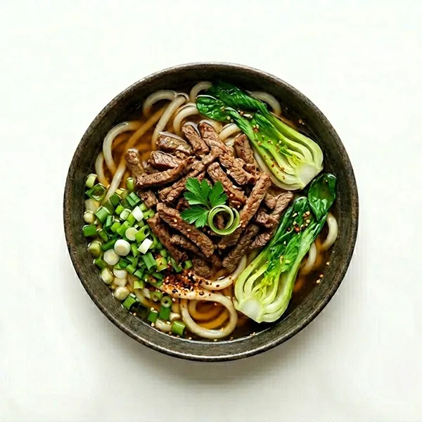 Beef and Udon Noodle Bowl With Scallion and Pok choy